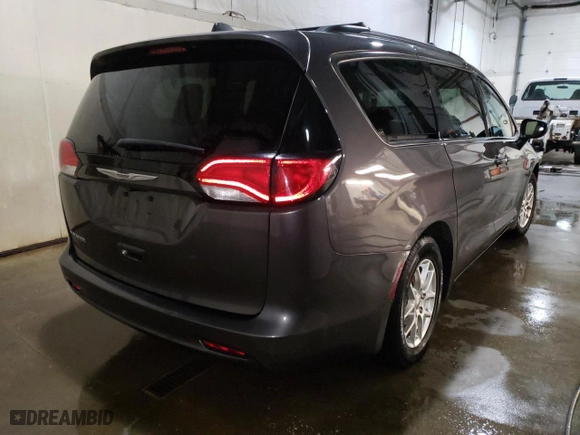 2021 Chrysler Voyager LXI with VIN 2C4RC1DG5MR523411, listed as a Copart auction lot 51864975 with 94,374 mi miles and Clean Title. Bid and sale history available at carsss.com. Image 3.