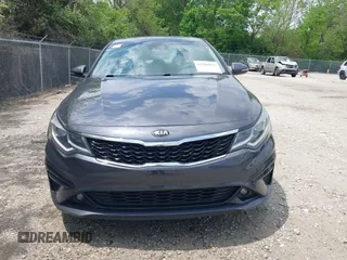 2019 Kia Optima LX z VIN 5XXGT4L32KG298796, wystawiony jako IAAI lot #42266827 z przebiegiem 89 841 mil mil oraz . Historia ofert i sprzedaży dostępna na DreamBid. Obrazek 12.