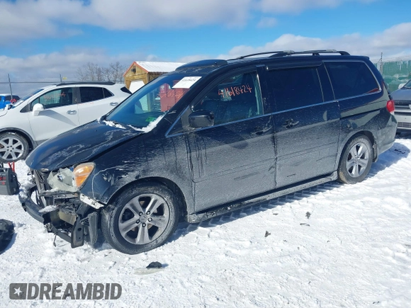 2008 Honda Odyssey Touring with VIN 5FNRL38948B029193, listed as a IAAI auction lot 41618424 with 219,964 mi miles. Bid and sale history available at carsss.com. Image 20.