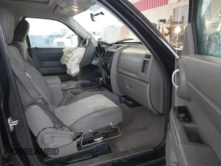 2007 Dodge Nitro SXT with VIN 1D8GT28K67W683600, listed as a IAAI auction lot 40958011 with 70,141 mi miles. Bid and sale history available at carsss.com. Image 5.
