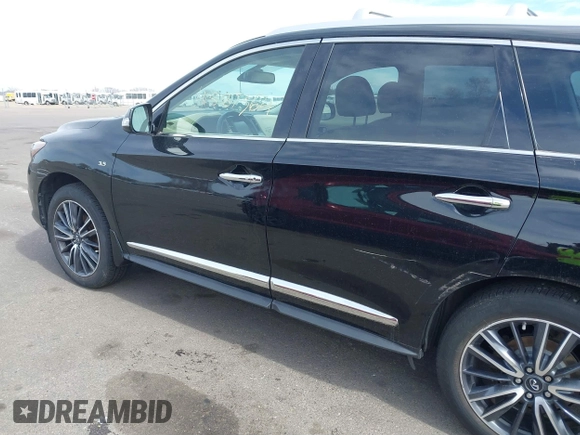 2017 Infiniti QX60 with VIN 5N1DL0MM0HC501577, listed as a IAAI auction lot 41887364 with 124,602 mi miles and . Bid and sale history available at DreamBid. Image 6.