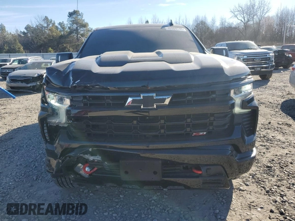 2023 Chevrolet Silverado 1500 LT Trail Boss with VIN 3GCUDFE84PG273892, listed as a Copart auction lot 46909745 with 59,466 mi miles and Salvage Title. Bid and sale history available at DreamBid. Image 5.
