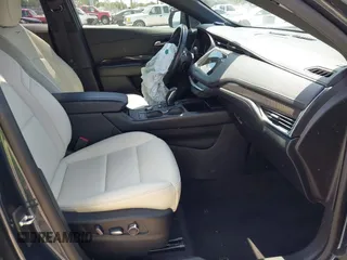 2019 Cadillac XT4 FWD Sport with VIN 1GYFZER42KF107032, listed as a IAAI auction lot 42193557 with 96,615 mi miles and . Bid and sale history available at DreamBid. Image 5.