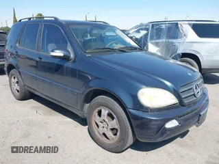 2002 Mercedes-Benz M-Class with VIN 4JGAB54E82A323495, listed as a IAAI auction lot 41848530 with 161,317 mi miles. Bid and sale history available at carsss.com. Image 1.