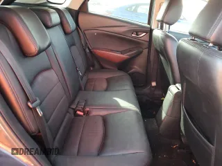 2017 Mazda CX-3 Touring z VIN JM1DKDC77H0151148, wystawiony jako Copart lot #81897434 z przebiegiem Nie podano mil oraz Szkoda całkowita • Salvage title. Historia ofert i sprzedaży dostępna na DreamBid. Obrazek 10.