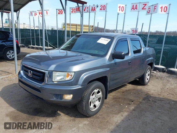 2011 Honda Ridgeline RT z VIN 5FPYK1F26BB453191, wystawiony jako IAAI lot #41776280 z przebiegiem 122 908 mil mil oraz . Historia ofert i sprzedaży dostępna na DreamBid. Obrazek 2.