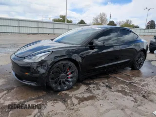 2023 Tesla Model 3 Performance z VIN 5YJ3E1ECXPF628019, wystawiony jako Copart lot #53554215 z przebiegiem 22 557 mil mil oraz Szkoda całkowita • Salvage title. Historia ofert i sprzedaży dostępna na DreamBid. Obrazek 1.