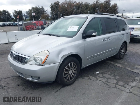 2012 Kia Sedona EX with VIN KNDMH4C72C6494230, listed as a IAAI auction lot 41522317 with 120,292 mi miles. Bid and sale history available at carsss.com. Image 2.