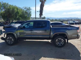 2023 Toyota Tacoma 4WD SR with VIN 3TMCZ5AN1PM600236, listed as a IAAI auction lot 41603152 with 35,956 mi miles. Bid and sale history available at carsss.com. Image 14.
