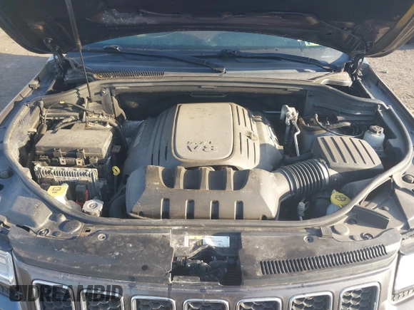 2015 Jeep Grand Cherokee Overland with VIN 1C4RJFCT3FC725239, listed as a IAAI auction lot 41779555 with 100,837 mi miles. Bid and sale history available at carsss.com. Image 10.