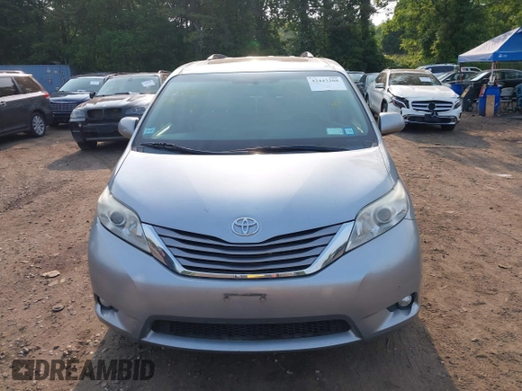 2015 Toyota Sienna XLE with VIN 5TDYK3DC2FS582546, listed as a IAAI auction lot 42443288 with 274,214 mi miles and . Bid and sale history available at DreamBid. Image 12.