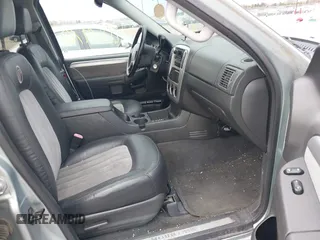 2005 Mercury Mountaineer Convenience z VIN 4M2ZU86K65UJ10015, wystawiony jako IAAI lot #42063970 z przebiegiem 153 542 mil mil oraz . Historia ofert i sprzedaży dostępna na DreamBid. Obrazek 5.