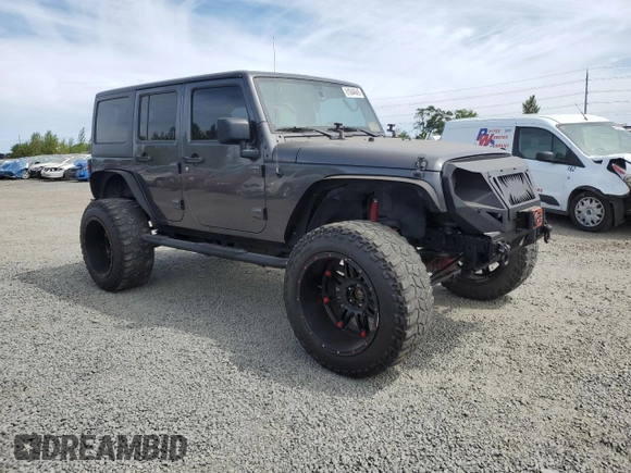 2016 Jeep Wrangler Unlimited Freedom with VIN 1C4BJWDG8GL300314, listed as a Copart auction lot 61044645 with 103,396 mi miles and Clean title. Bid and sale history available at DreamBid. Image 4.