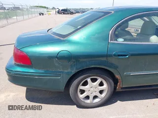 2000 Mercury Sable LS Premium z VIN 1MEFM55S4YA648211, wystawiony jako IAAI lot #42354578 z przebiegiem 72 686 mil mil oraz . Historia ofert i sprzedaży dostępna na DreamBid. Obrazek 6.