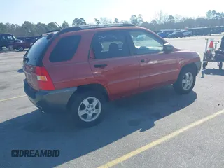 2007 Kia Sportage LX with VIN KNDJF724977426704, listed as a IAAI auction lot 41769772 with 288,082 mi miles and . Bid and sale history available at carsss.com. Image 4.