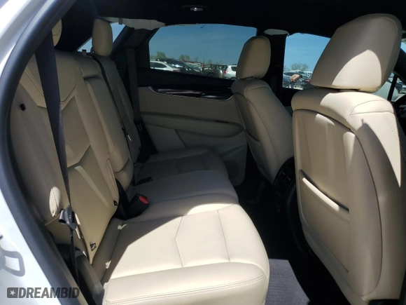 2019 Cadillac XT5 FWD with VIN 1GYKNARS0KZ121284, listed as a Copart auction lot 49339815 with 56,759 mi miles and Salvage Title. Bid and sale history available at carsss.com. Image 12.