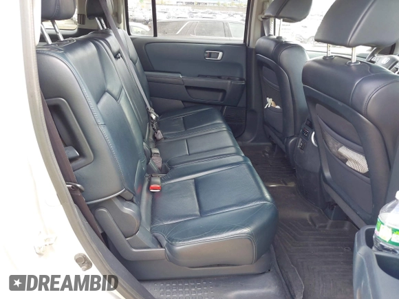 2009 Honda Pilot EX-L with VIN 5FNYF48599B025471, listed as a IAAI auction lot 42133938 with 217,105 mi miles. Bid and sale history available at carsss.com. Image 8.