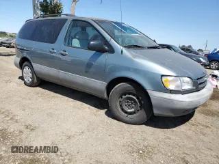 2000 Toyota Sienna LE with VIN 4T3ZF13C6YU296375, listed as a Copart auction lot 63846875 with 279,915 mi miles and Salvage title. Bid and sale history available at DreamBid. Image 4.