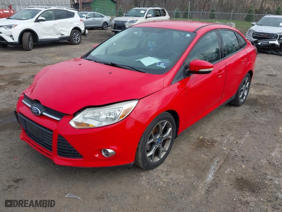 2013 Ford Focus SE with VIN 1FADP3F2XDL291995, listed as a IAAI auction lot 41949607 with 129,298 mi miles. Bid and sale history available at carsss.com. Image 2.
