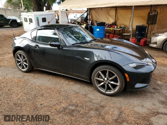 2023 Mazda MX-5 Miata Grand Touring with VIN JM1NDAM76P0551177, listed as a Copart auction lot 46320214 with 2,803 mi miles and Clean title. Bid and sale history available at DreamBid. Image 4.