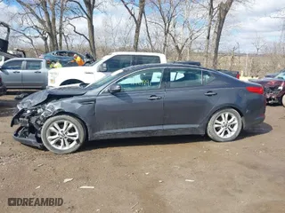 2011 Kia Optima EX with VIN KNAGN4A75B5156895, listed as a IAAI auction lot 41729991 with 151,348 mi miles. Bid and sale history available at carsss.com. Image 14.
