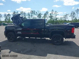 2017 GMC Sierra 1500 SLE with VIN 3GTU2MEC6HG413635, listed as a IAAI auction lot 41996497 with 63,532 mi miles. Bid and sale history available at carsss.com. Image 14.