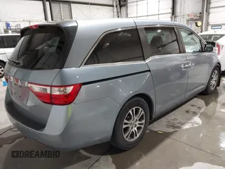 2011 Honda Odyssey EX with VIN 5FNRL5H44BB051539, listed as a IAAI auction lot 42119192 with 207,522 mi miles and . Bid and sale history available at carsss.com. Image 4.