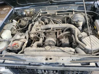 1991 Isuzu Trooper z VIN JACCH58E3M7900325, wystawiony jako Copart lot #79525294 z przebiegiem 146 593 mil mil oraz Czysty tytuł • Clean title. Historia ofert i sprzedaży dostępna na DreamBid. Obrazek 12.