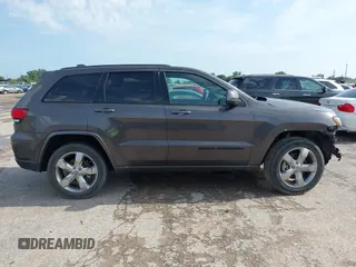 2021 Jeep Grand Cherokee Laredo E z VIN 1C4RJEAGXMC844631, wystawiony jako IAAI lot #42516098 z przebiegiem 65 564 mil mil oraz . Historia ofert i sprzedaży dostępna na DreamBid. Obrazek 13.