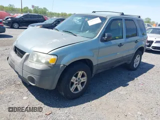 2005 Ford Escape Hybrid z VIN 1FMCU96HX5KC07151, wystawiony jako IAAI lot #42093744 z przebiegiem 275 661 mil mil oraz . Historia ofert i sprzedaży dostępna na DreamBid. Obrazek 18.