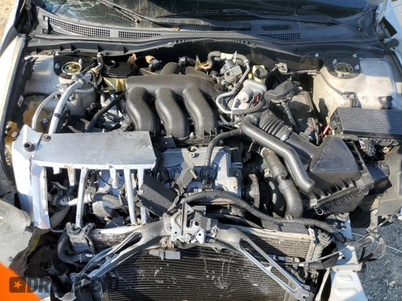 2006 Mercury Milan Premier z VIN 3MEFM08176R611016, wystawiony jako Copart lot #70576844 z przebiegiem Nie podano mil oraz Szkoda całkowita • Salvage title. Historia ofert i sprzedaży dostępna na DreamBid. Obrazek 11.