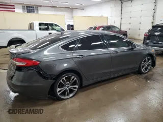 2019 Ford Fusion Titanium with VIN 3FA6P0D94KR261090, listed as a Copart auction lot 88571535 with 146,132 mi miles and Clean Title. Bid and sale history available at carsss.com. Image 3.