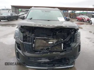 2022 Kia Telluride EX z VIN 5XYP3DHC3NG222108, wystawiony jako IAAI lot #41759771 z przebiegiem 129 098 mil mil oraz . Historia ofert i sprzedaży dostępna na DreamBid. Obrazek 6.