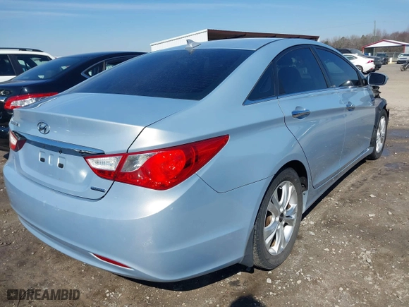 2013 Hyundai Sonata SE with VIN 5NPEC4AC9DH647065, listed as a IAAI auction lot 41636762 with 148,669 mi miles. Bid and sale history available at carsss.com. Image 4.