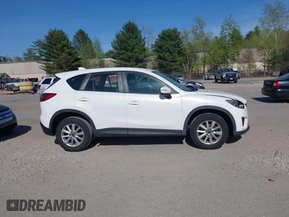 2015 Mazda CX-5 Sport with VIN JM3KE4BY3F0495511, listed as a IAAI auction lot 42170968 with 206,217 mi miles and . Bid and sale history available at carsss.com. Image 13.