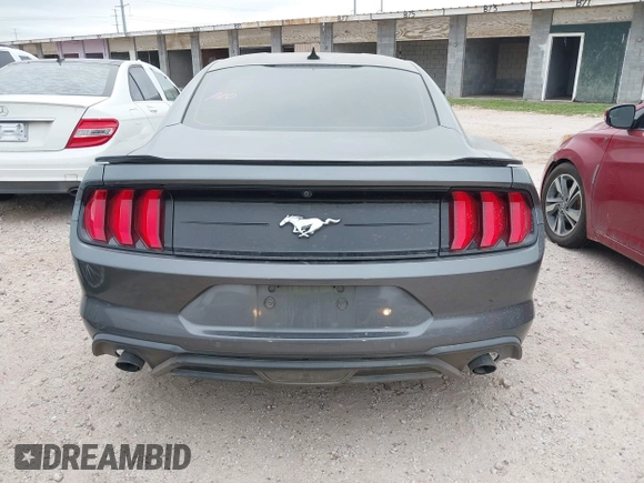 2021 Ford Mustang EcoBoost z VIN 1FA6P8TH9M5141038, wystawiony jako IAAI lot #41965588 z przebiegiem 35 344 mil mil oraz . Historia ofert i sprzedaży dostępna na DreamBid. Obrazek 16.