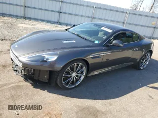 2014 Aston Martin DB9 z VIN SCFFDAAM7EGA15331, wystawiony jako Copart lot #48941975 z przebiegiem 18 582 mil mil oraz Szkody całkowita. Historia ofert i sprzedaży dostępna na DreamBid. Obrazek 1.