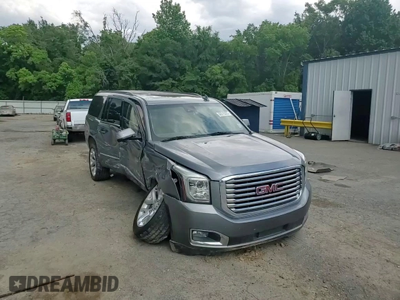 2019 GMC Yukon XL SLT z VIN 1GKS1GKC0KR325305, wystawiony jako Copart lot #56219325 z przebiegiem 136 295 mil mil oraz Szkoda całkowita • Salvage title. Historia ofert i sprzedaży dostępna na DreamBid. Obrazek 14.