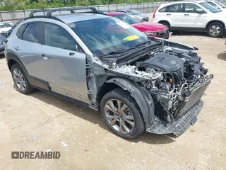 2021 Mazda CX-30 Select with VIN 3MVDMBBL1MM245514, listed as a IAAI auction lot 42517295 with 71,270 mi miles and . Bid and sale history available at DreamBid. Image 1.