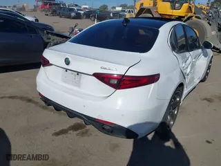 2019 Alfa Romeo Giulia Ti with VIN ZARFAMBN0K7606230, listed as a IAAI auction lot 41421769 with 69,274 mi miles. Bid and sale history available at carsss.com. Image 4.