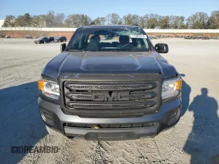 2017 GMC Canyon 2WD with VIN 1GTG5BEA7H1227043, listed as a Copart auction lot 77062374 with 101,338 mi miles and Salvage Title. Bid and sale history available at carsss.com. Image 5.
