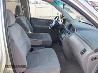 2004 Honda Odyssey LX with VIN 5FNRL18534B007617, listed as a IAAI auction lot 42687524 with 220,079 mi miles and . Bid and sale history available at DreamBid. Image 5.