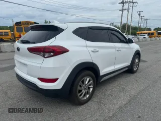 2018 Hyundai Tucson SEL Plus z VIN KM8J33A40JU676727, wystawiony jako Copart lot #59302255 z przebiegiem 128 559 mil mil oraz Czysty tytuł • Clean title. Historia ofert i sprzedaży dostępna na DreamBid. Obrazek 4.