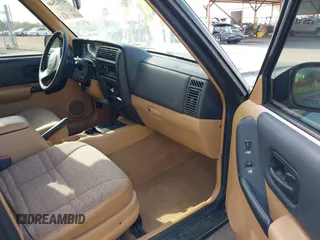 1998 Jeep Cherokee Sport with VIN 1J4FT68S8WL131348, listed as a IAAI auction lot 41912540 with 111,579 mi miles. Bid and sale history available at carsss.com. Image 5.