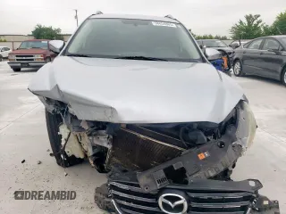 2016 Mazda CX-5 Sport с VIN JM3KE4BY3G0779206, выставлен на аукционе Copart как лот 58854805 с пробегом 144 434 миль миль и Чистый • Clean title. История ставок и продаж доступна на DreamBid. Изображение 5.