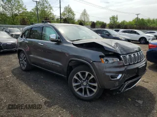 2017 Jeep Grand Cherokee Overland z VIN 1C4RJFCG2HC913434, wystawiony jako Copart lot #56580955 z przebiegiem 86 358 mil mil oraz Szkoda całkowita • Salvage title. Historia ofert i sprzedaży dostępna na DreamBid. Obrazek 4.