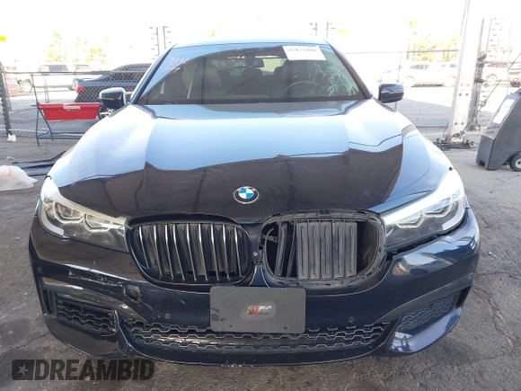 2019 BMW 7 Series 740i with VIN WBA7E2C58KB218419, listed as a IAAI auction lot 41831080 with 97,752 mi miles and . Bid and sale history available at DreamBid. Image 6.