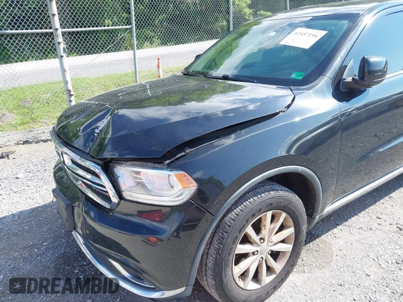 2015 Dodge Durango SXT with VIN 1C4RDJAG4FC795963, listed as a IAAI auction lot 42457196 with 161,800 mi miles and . Bid and sale history available at DreamBid. Image 17.