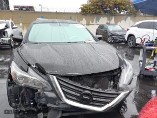 2018 Nissan Altima 2.5 SL with VIN 1N4AL3AP4JC288183, listed as a IAAI auction lot 41466582 with 100,858 mi miles. Bid and sale history available at carsss.com. Image 12.