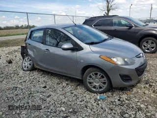 2011 Mazda 2 Sport z VIN JM1DE1HY1B0124249, wystawiony jako Copart lot #56141275 z przebiegiem 249 890 mil mil oraz Szkoda całkowita • Salvage title. Historia ofert i sprzedaży dostępna na DreamBid. Obrazek 4.